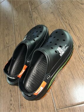 NWOT Men's Black Clog Sandals with Orange and Green Accents